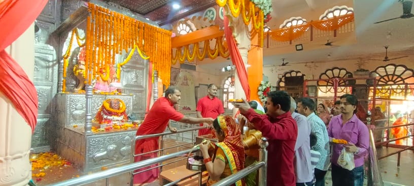 Devotees throng temples for the Goddess's *darshan*; chants of praise for the Mother Goddess reverberate.