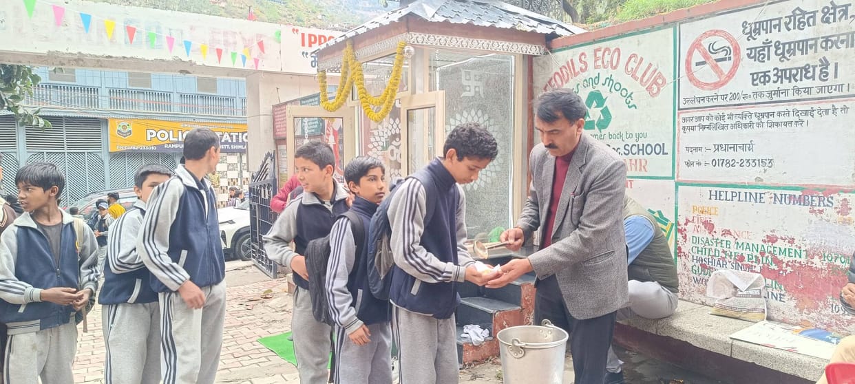 Halwa distributed in Padam Student School Rampur