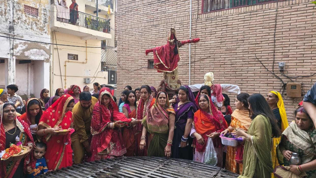 Women performed Gangaur puja by singing auspicious songs.