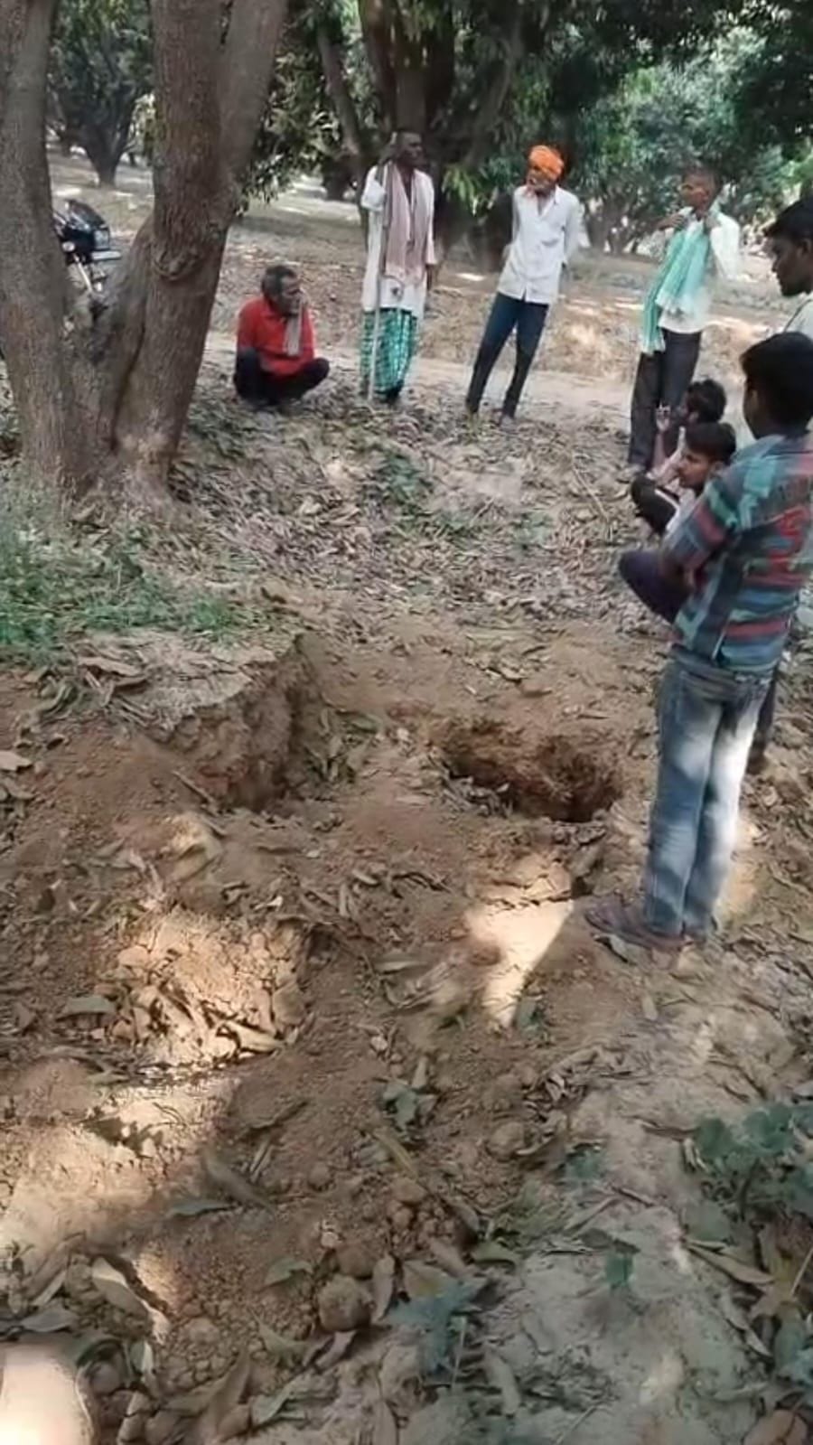 Neighbor accused of digging worker's grave