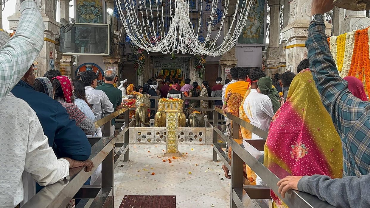 After two days of rain, devotees reached the temples as soon as the sun came out.