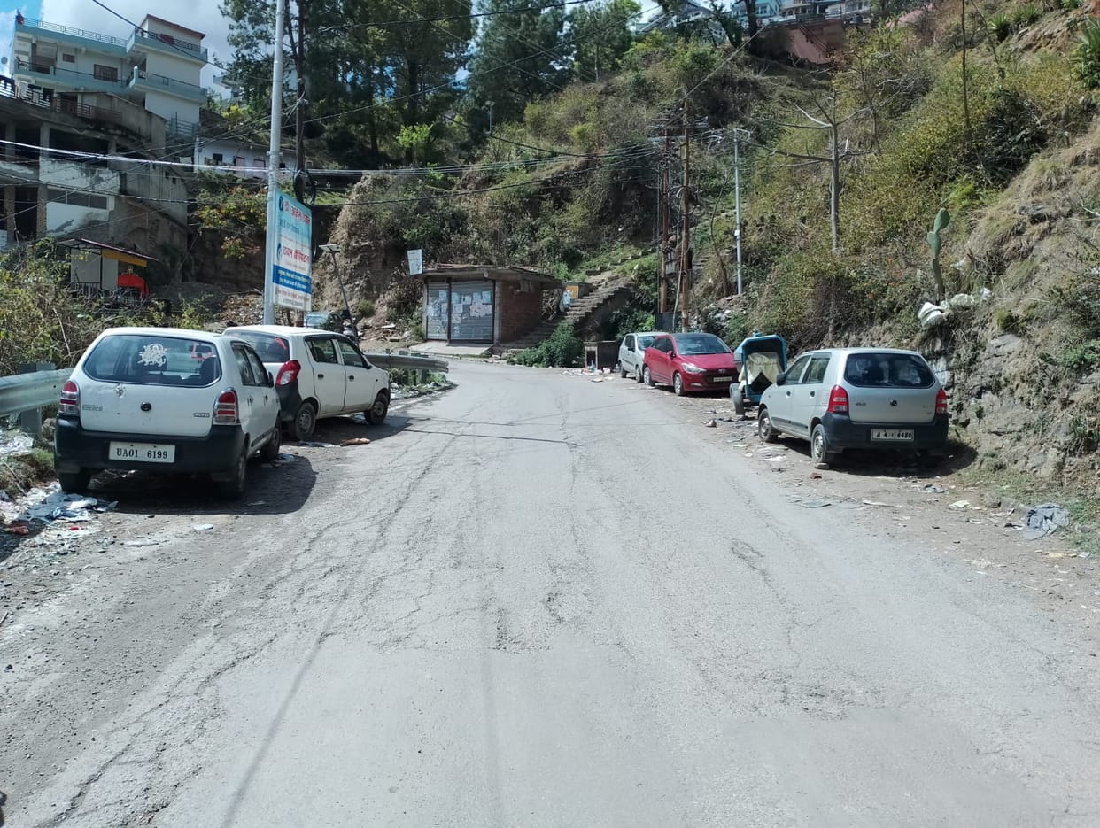 Vehicles parked diagonally on the Almora-Pithoragarh NH are putting brakes on traffic.