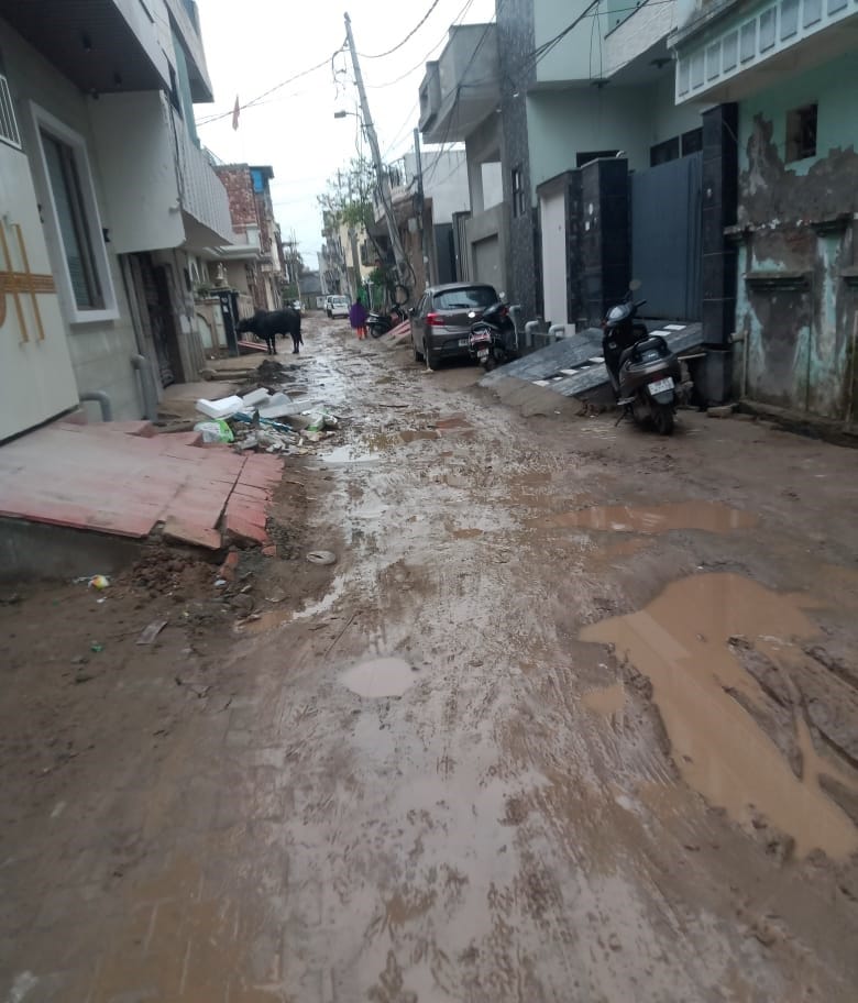 Mud and slippery conditions prevail on the main road of BD Floor Mill.