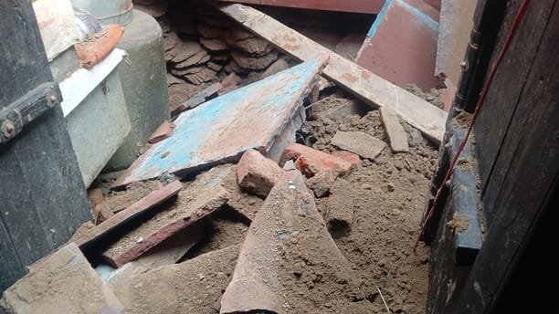 The roof of the dilapidated room collapsed