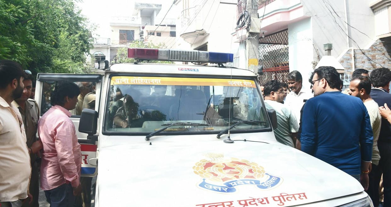 A sex racket was being run under the guise of a clinic; people held the doctor hostage and beat him.