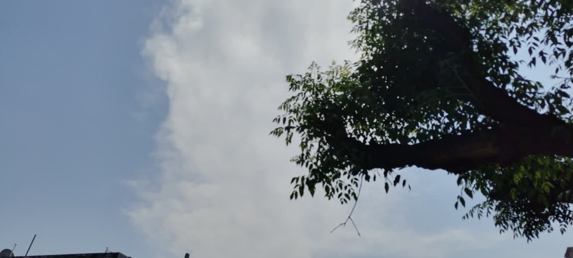 Clouds lingered amidst the sunshine, forecasting a change in weather