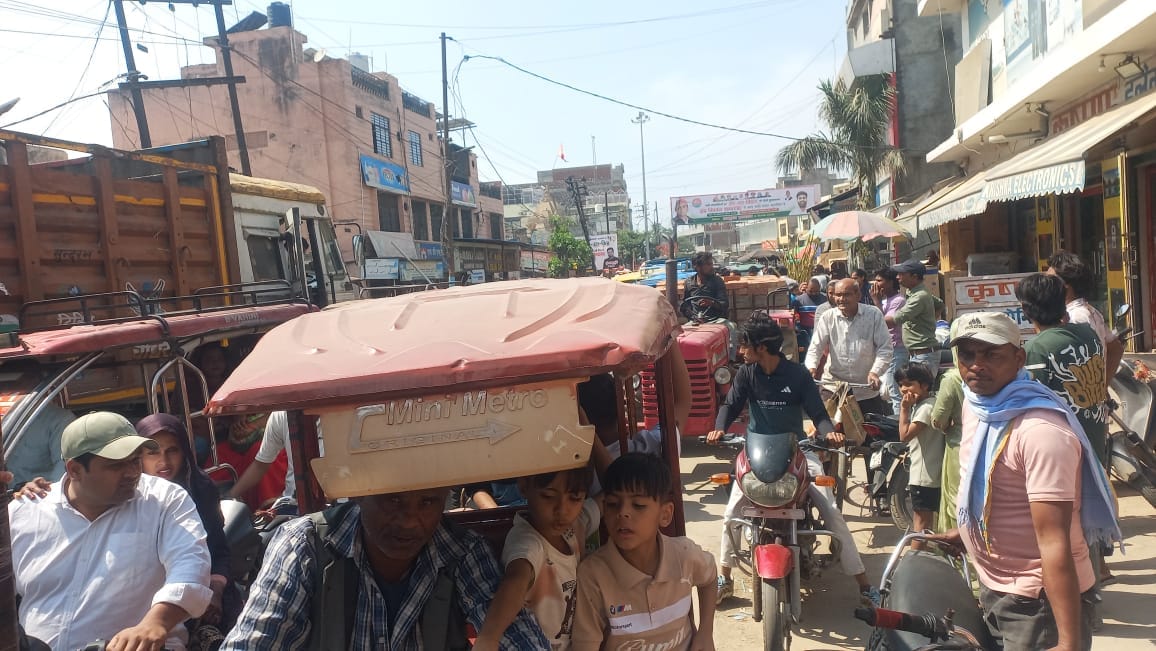 Encroachment and parking create traffic jam, woman injured