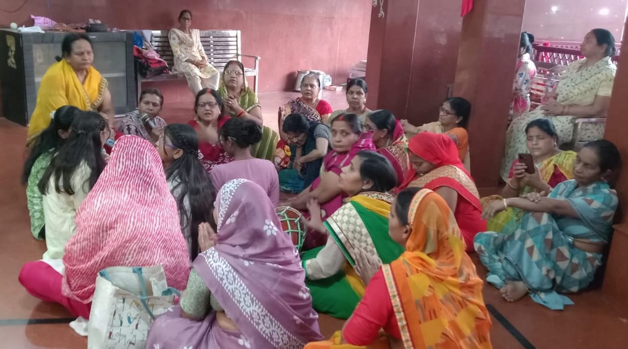 The temple resounded with the worship of Skandamata, and a crowd of devotees gathered
