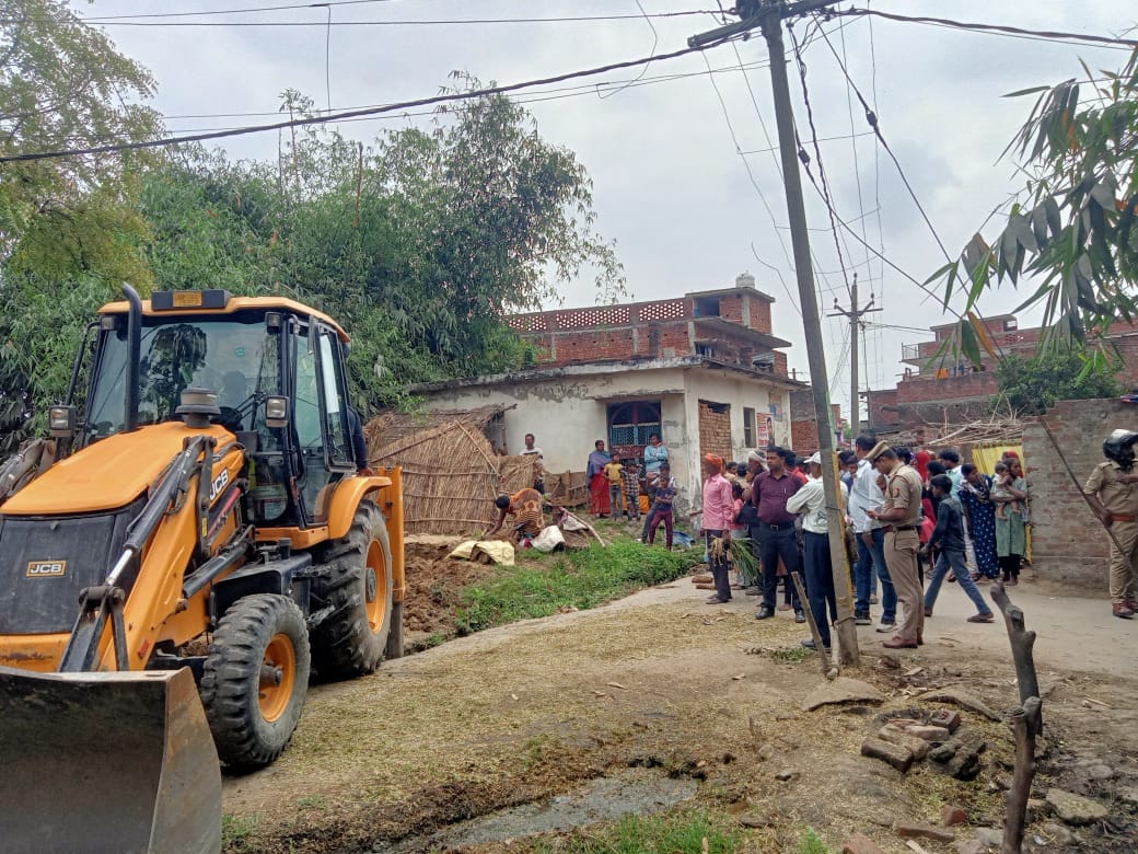 JCB removed encroachment of huts from canal track