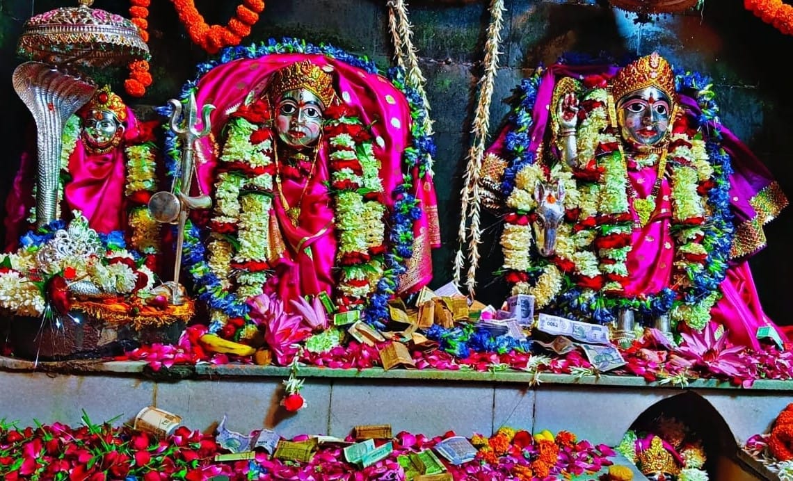 Worship of Mother Kushmanda with five flowers, offering Malpua and saffron halwa