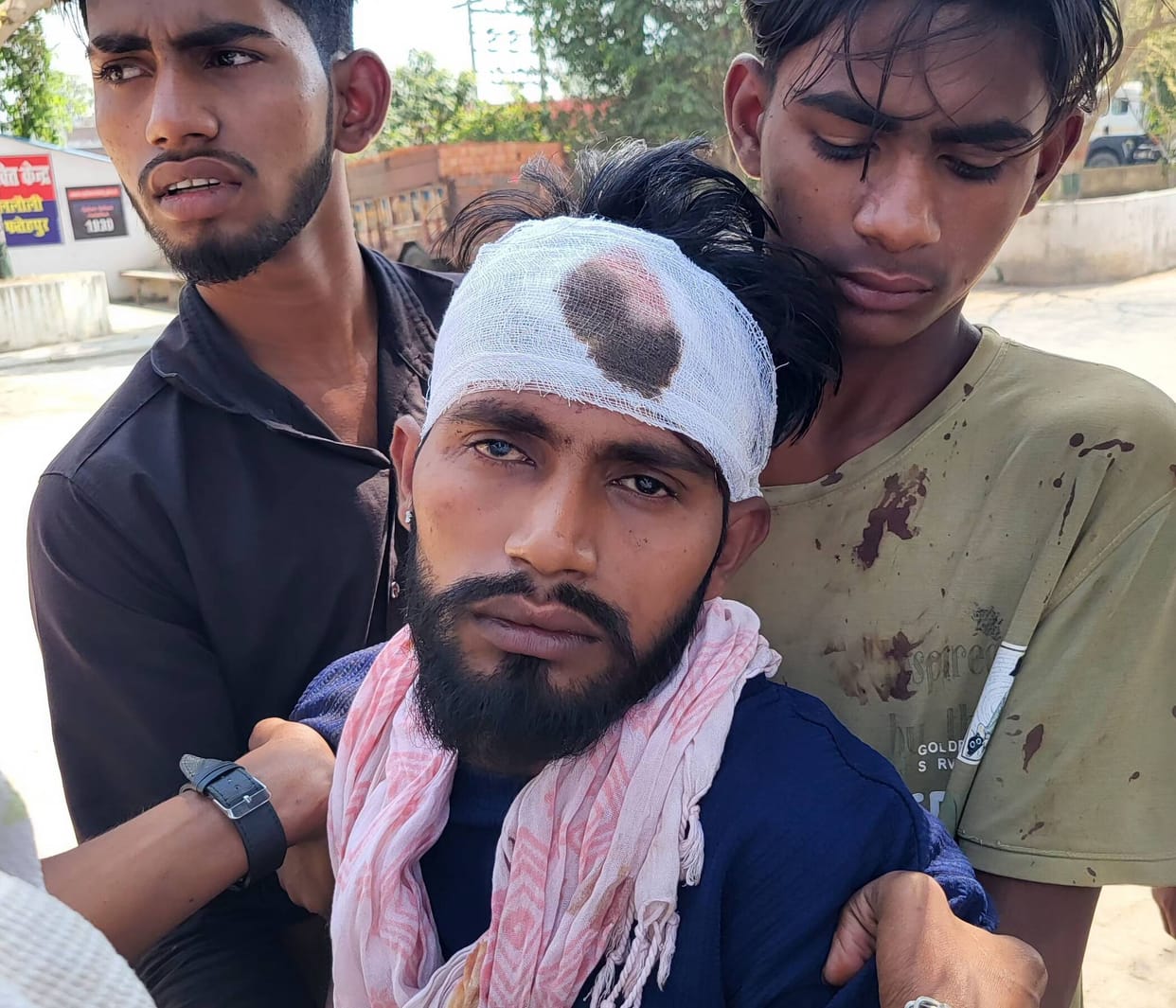 Five people, including a disabled brother and sister, were beaten with sticks after entering their home.