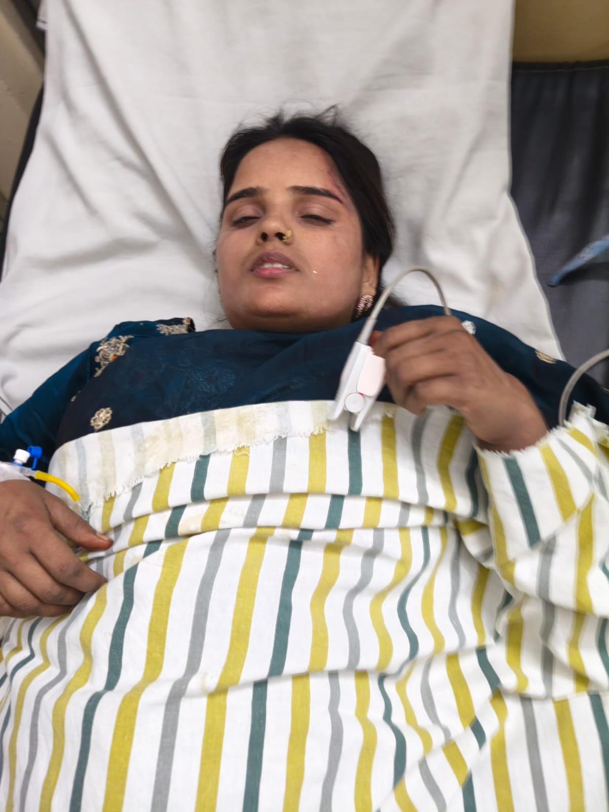 A swing fell at a fair due to a broken spring, injuring a couple and their daughter.