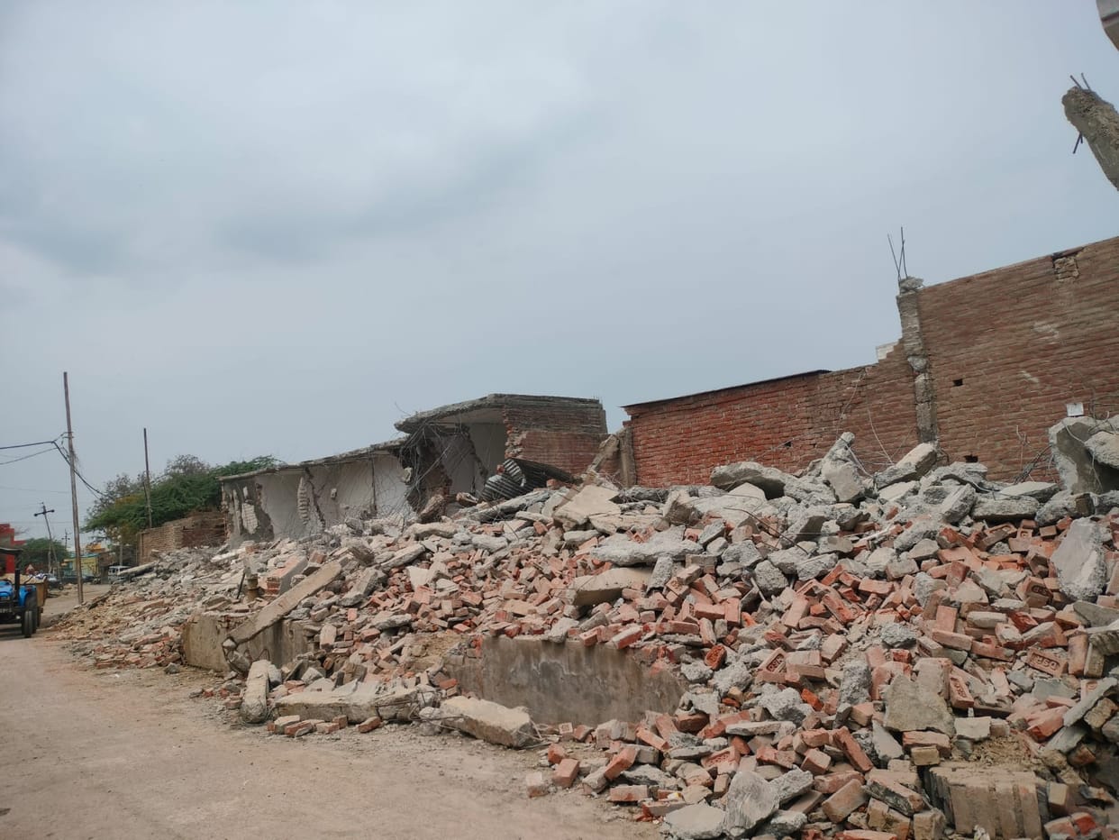 Executed a sale deed in his own name and facilitated the encroachment of government land.
