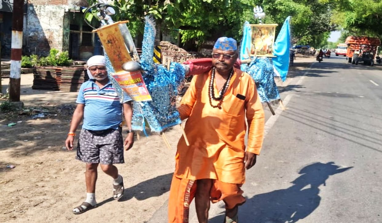 Mahants set out for Ujjain carrying holy water from the Ganges in Haridwar.