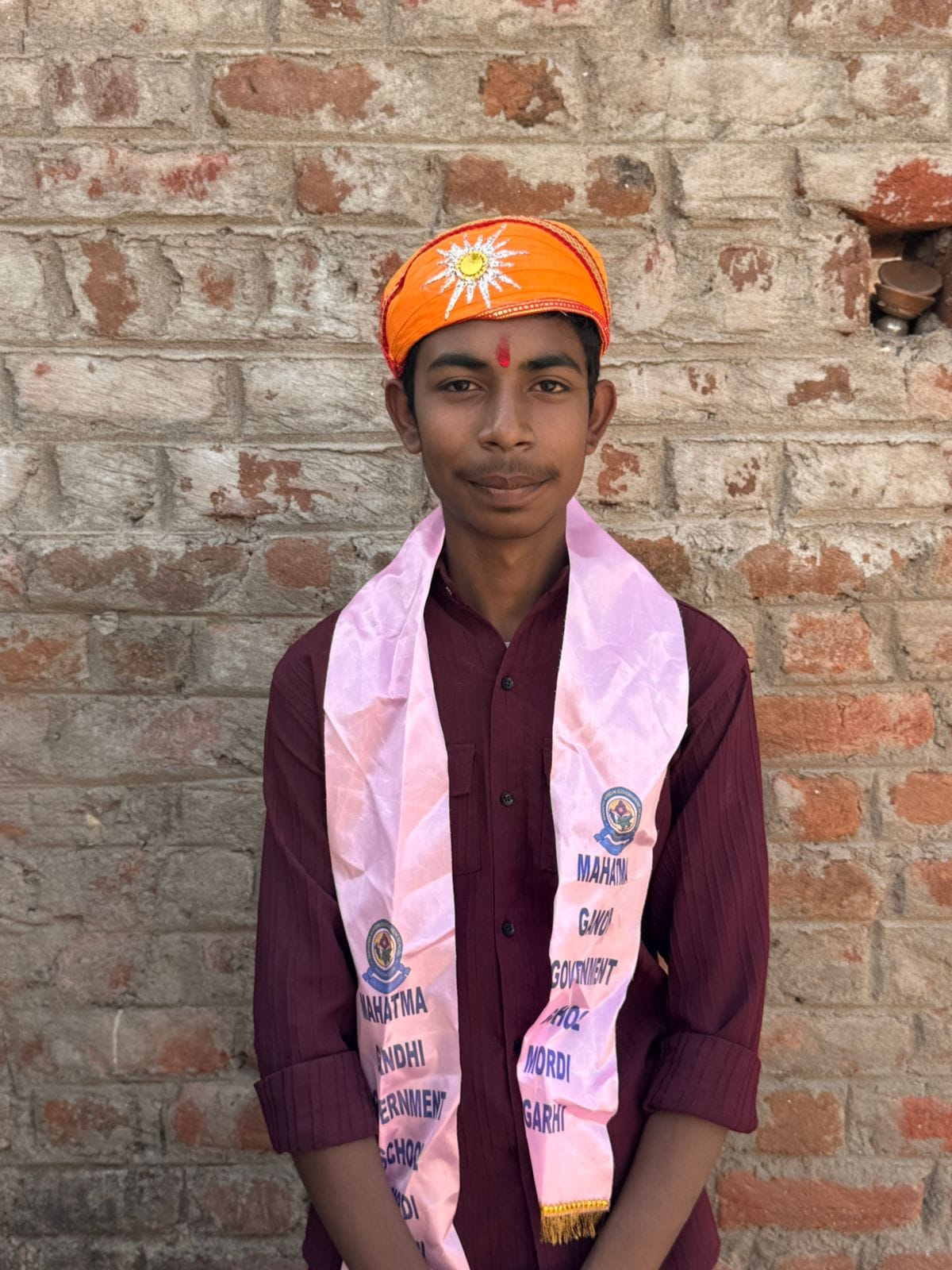 Helper couple’s son scores Ninety-seven point one seven percent in 10th under tarpaulin roof