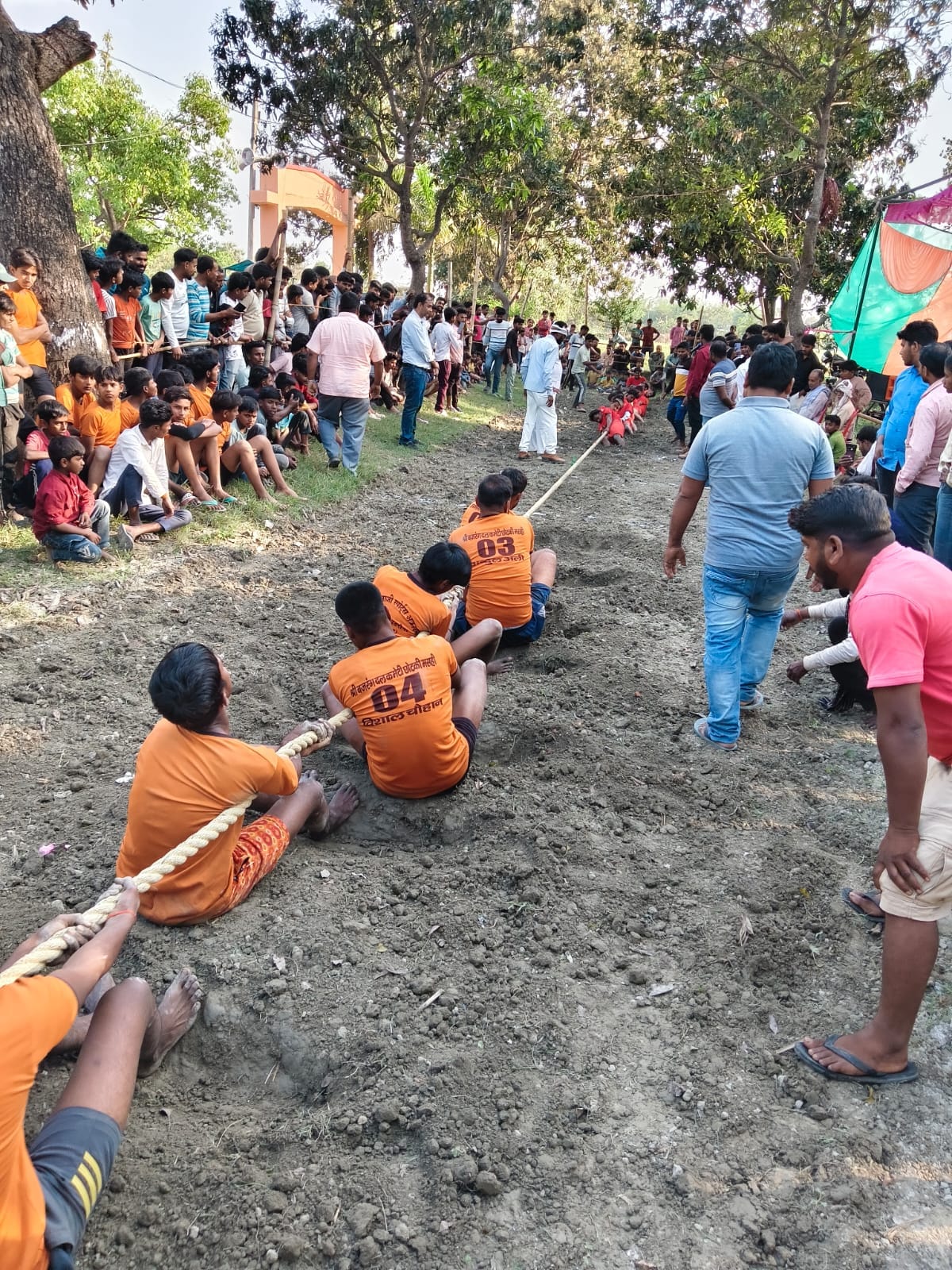 Teams from Vishunpura and Nauka Tola won the tug-of-war competition.