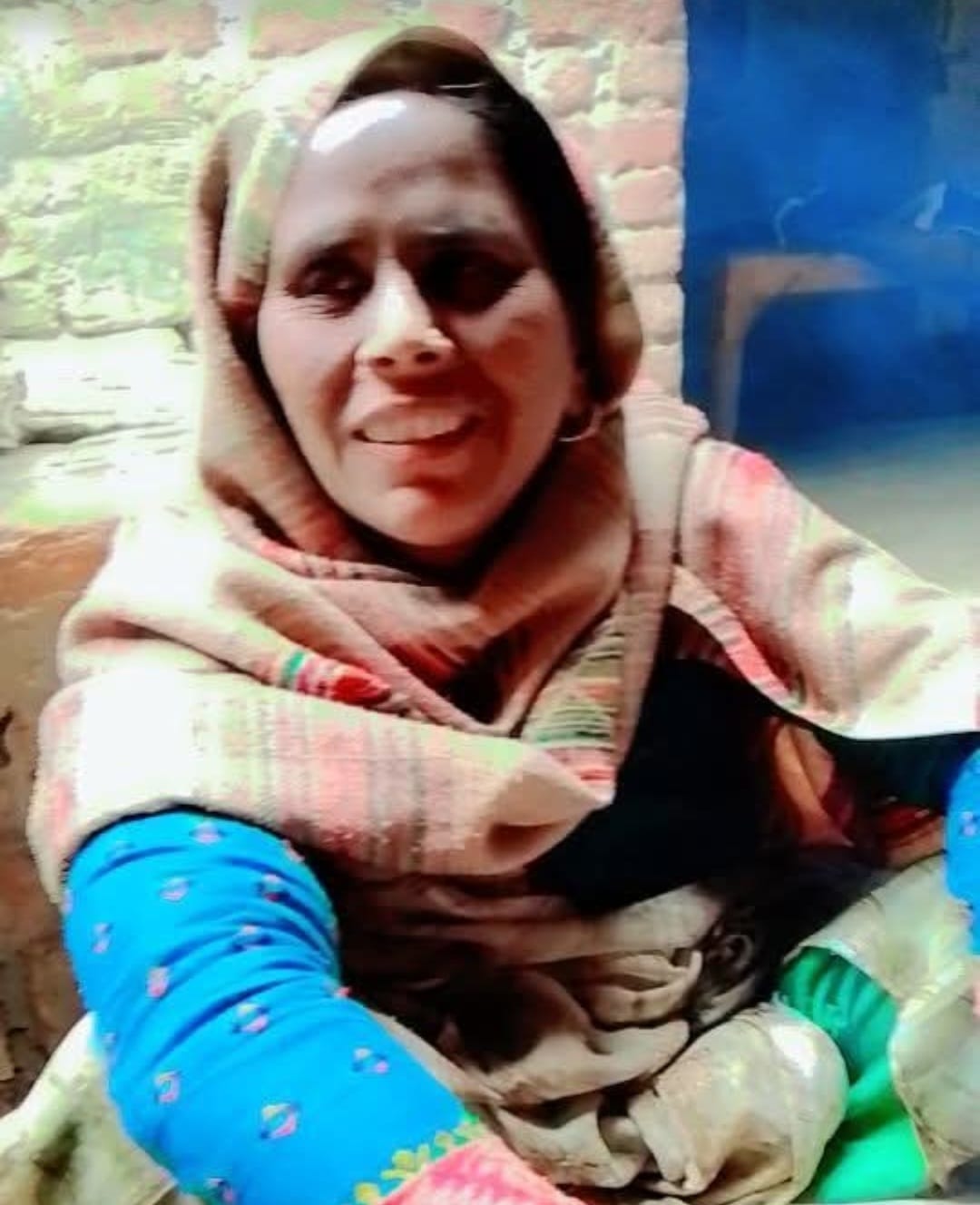 A pillar fell on a woman after she was hit by a buffalo