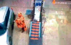 A salesman was robbed of Rs 7,260 at a petrol pump by brandishing a pistol.