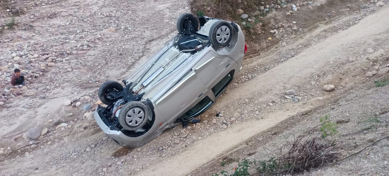 The car overturned uncontrollably, and the couple narrowly escaped.