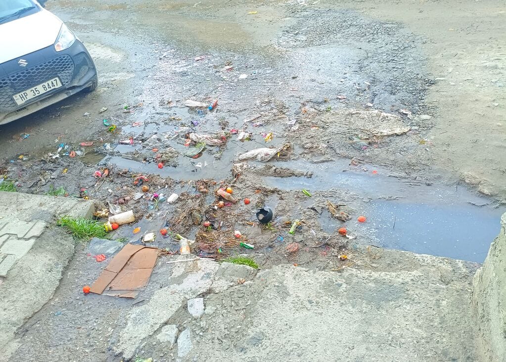 Dirty water flowing on the road near Dalash bus stand