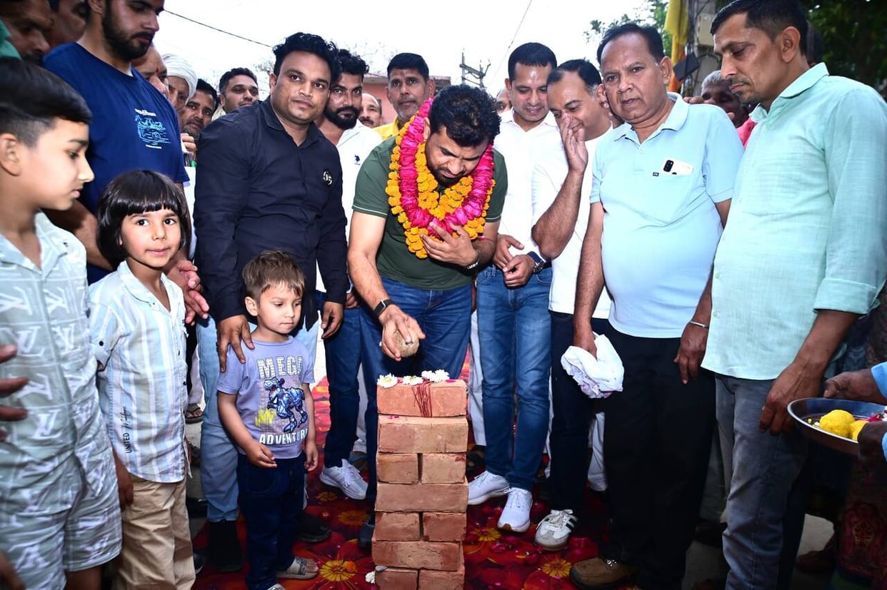 Drains will be built on both sides of the road in the street of Pranami Temple.