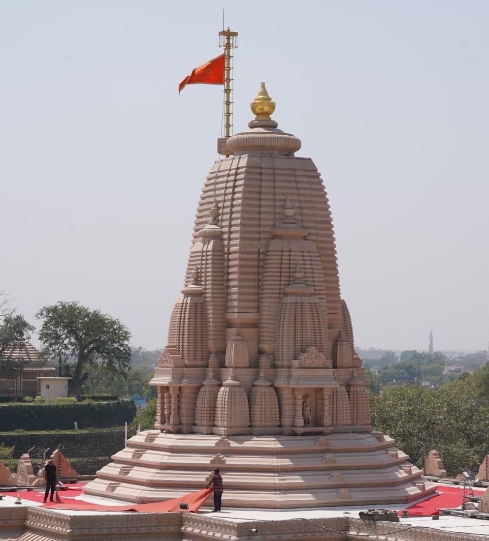 Saffron flag hoisted atop the Sun Temple's spire