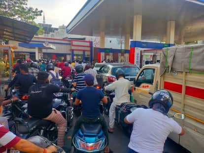 People are arriving with bottles and drums along with filling the tanks of their vehicles.