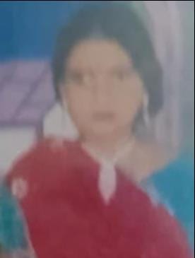 The body of a woman was found hanging under suspicious circumstances.