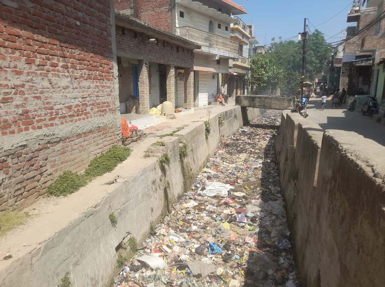 Walls have crumbled... drains lie exposed.