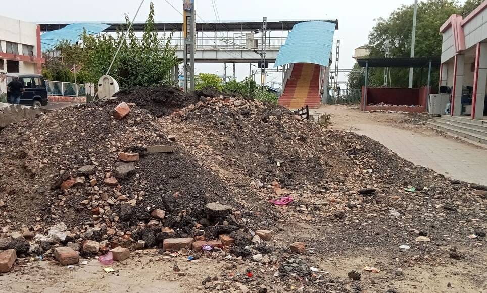 The road has been uprooted for six months, debris on the bridge path