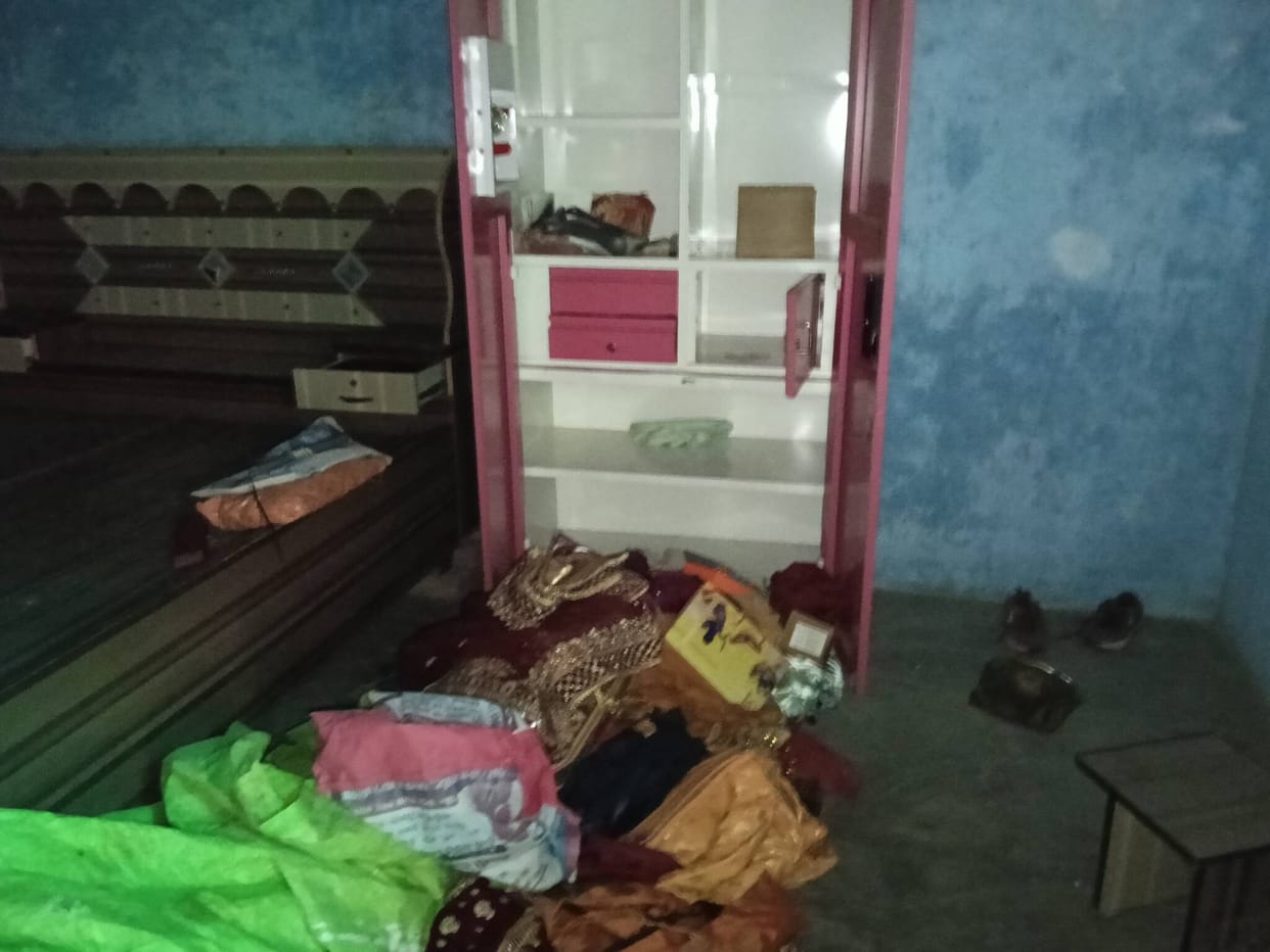 Uprooted tin shed and entered house, stole jewelery and valuables