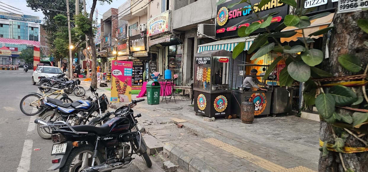 Encroachment... even in the market, the 10 feet wide footpath is occupied