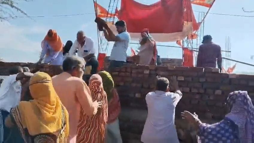 Two groups clashed over temple construction, injuring 12 people.