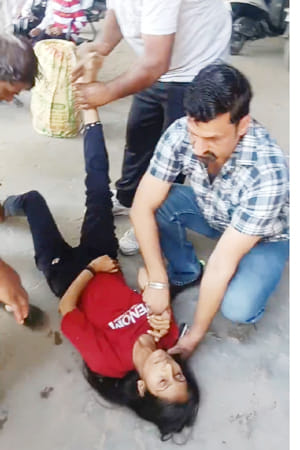 A young woman fainted while waiting in line for a cylinder slip.