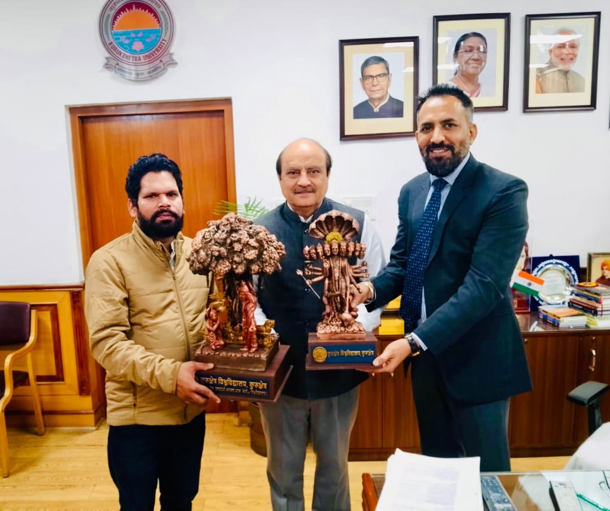 The University Fine Arts Department has prepared two magnificent statues embodying the message of the Gita.