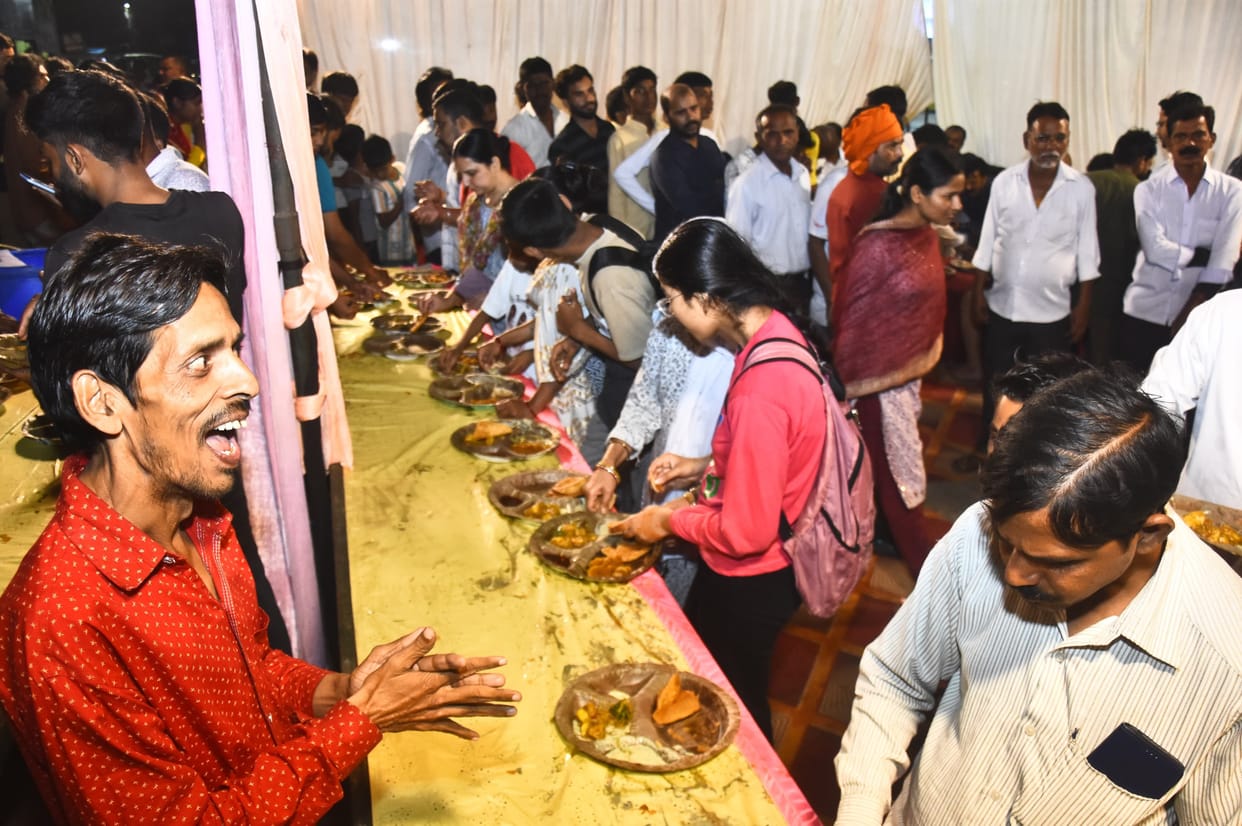 A community feast was organized alongside the worship of Mother Bhagavati.