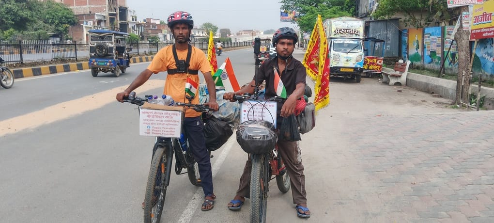 Two travelers on a cross-country cycling tour have reached Kushinagar.