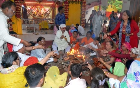 Devotees throng for the Goddess's darshan on the final day of Navratri.