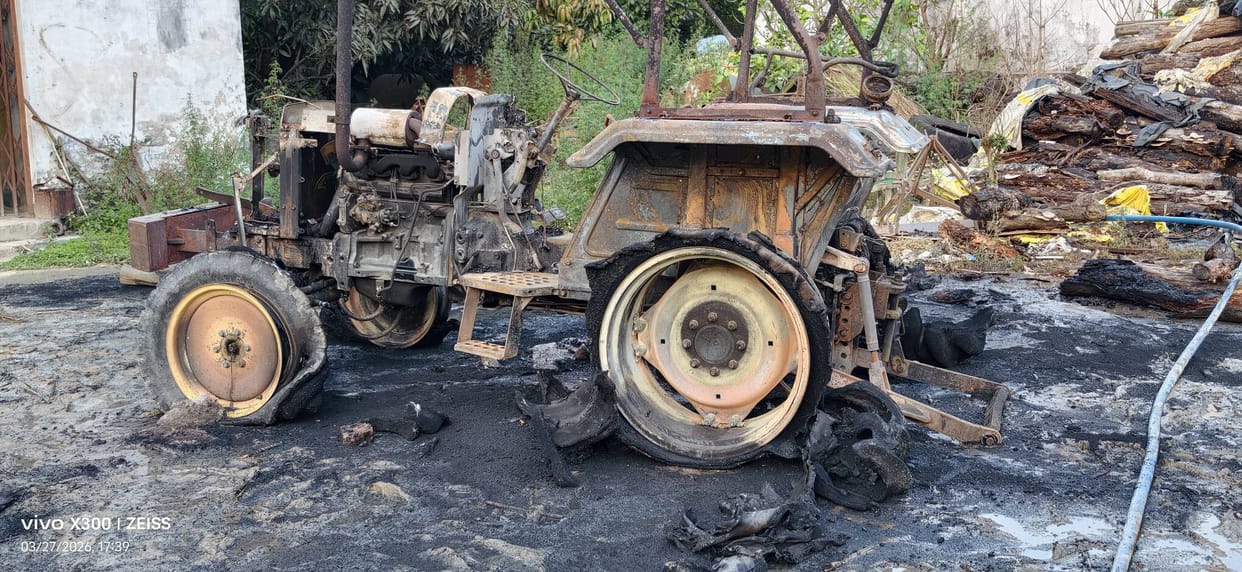 Tractor catches fire due to a short circuit.