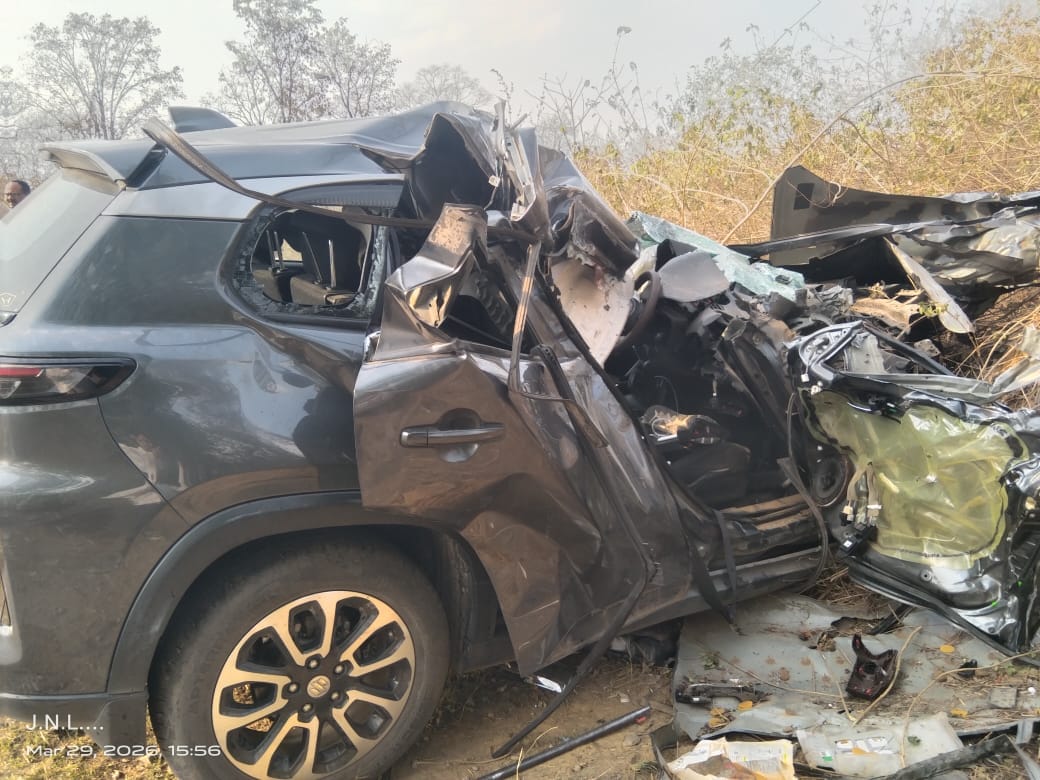 Truck approaching from opposite direction collides with car; Engineer killed, wife and son injured.