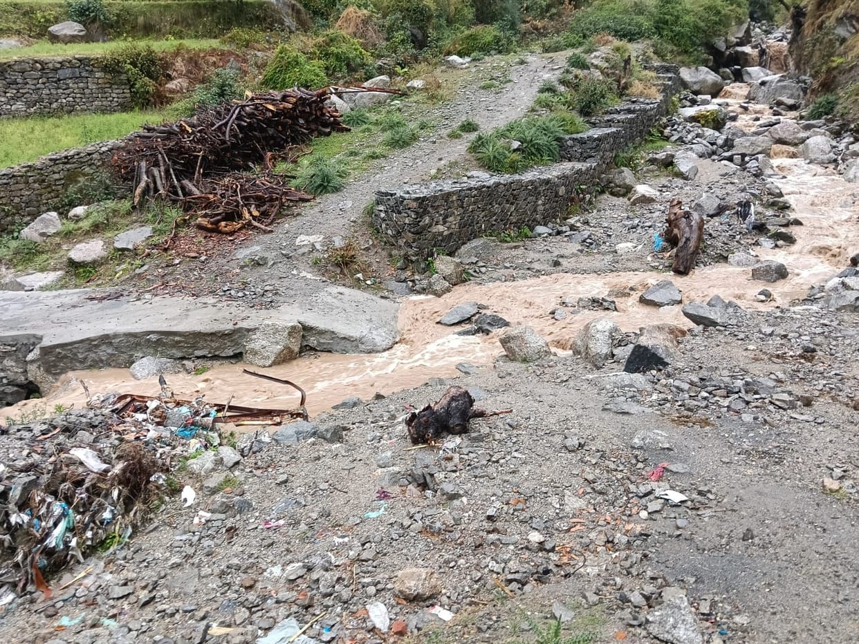 The people of Panjiyara are forced to pass through the drain.