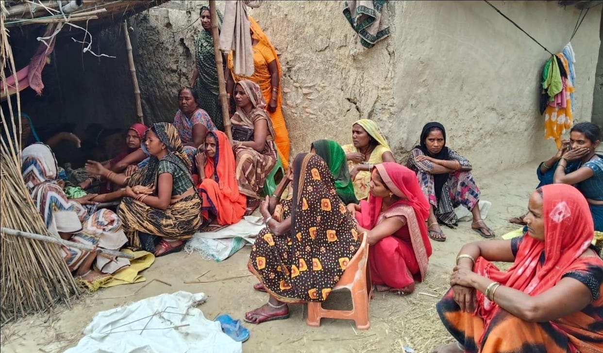 An elderly man was killed in a scuffle over possession of half a bigha of land; four accused arrested.