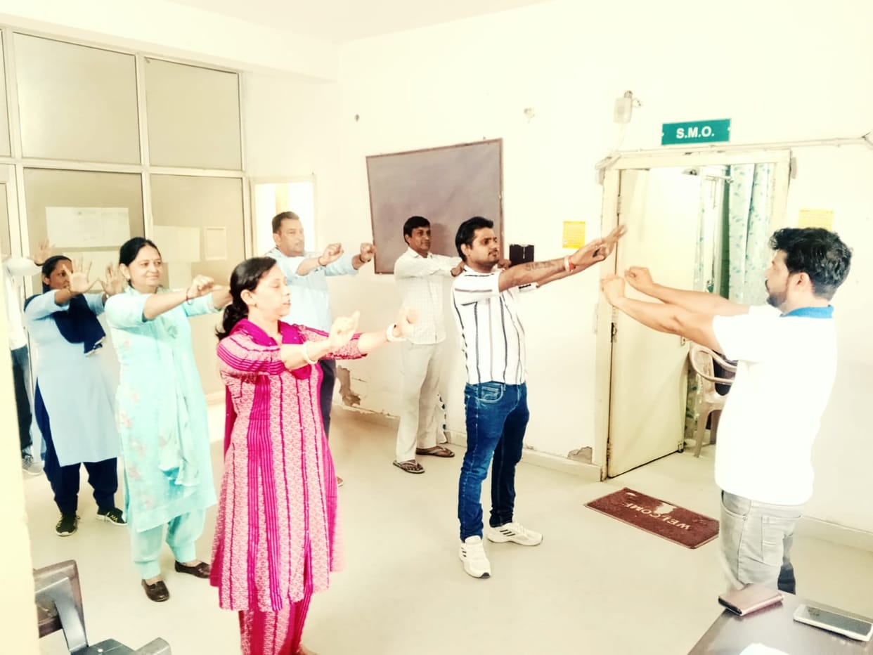 Employees practiced yoga for stress-free work.