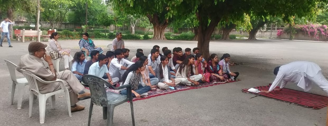 Students practiced yoga in the camp.