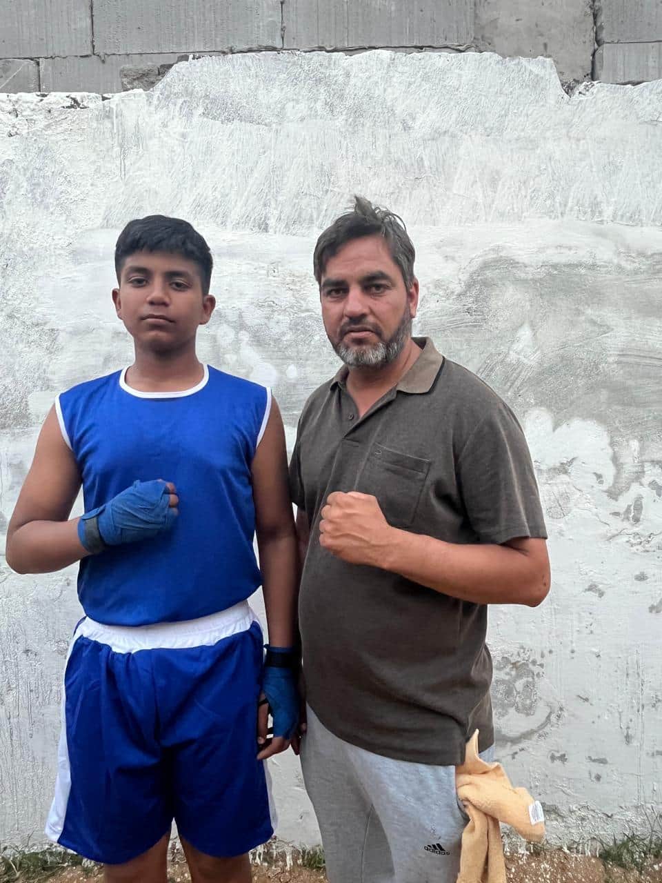 कोच संजय के साथ सार्थक। प्रवक्ता