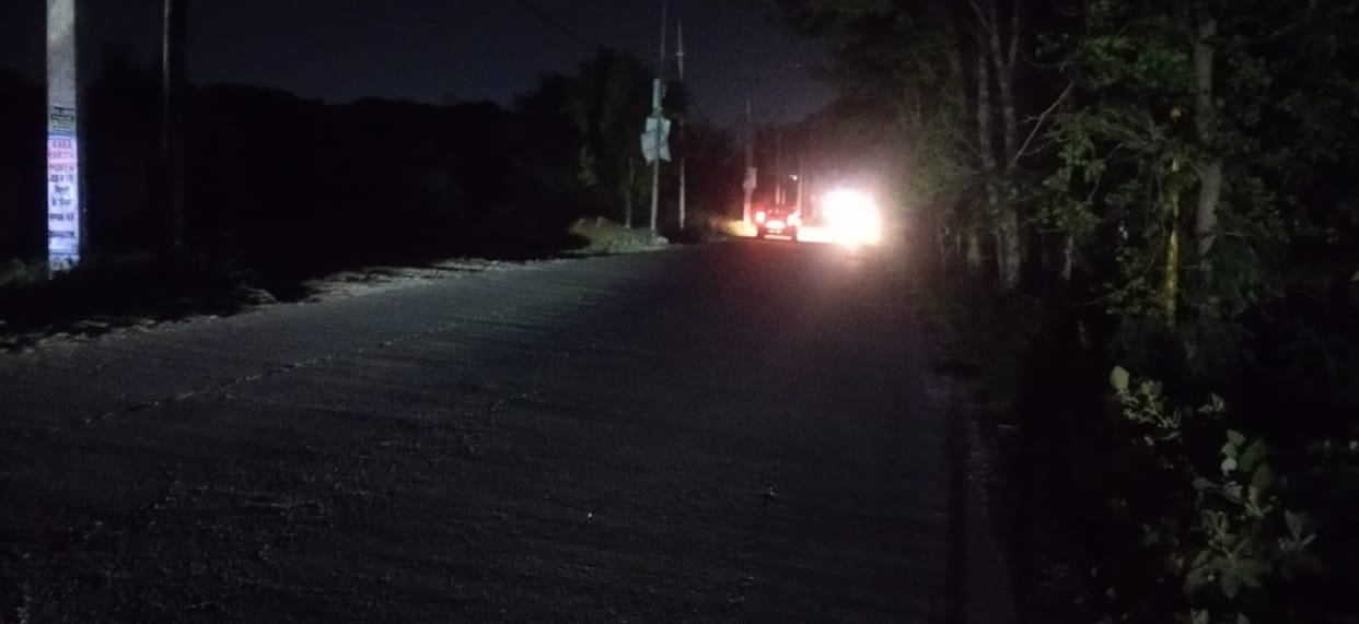 Darkness on the streets of Dharmanagari as evening falls