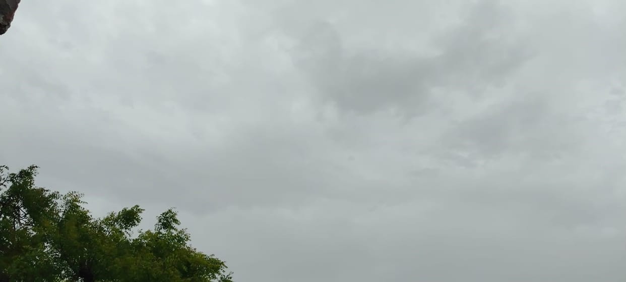 Light rain at night, cloudy skies with sunshine during the day