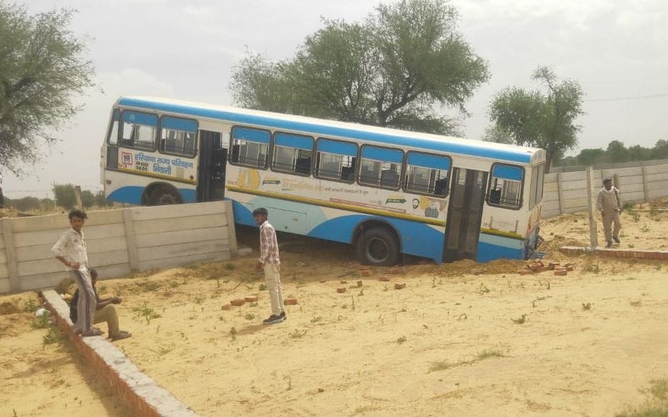The bus collided with a wall due to steering failure.