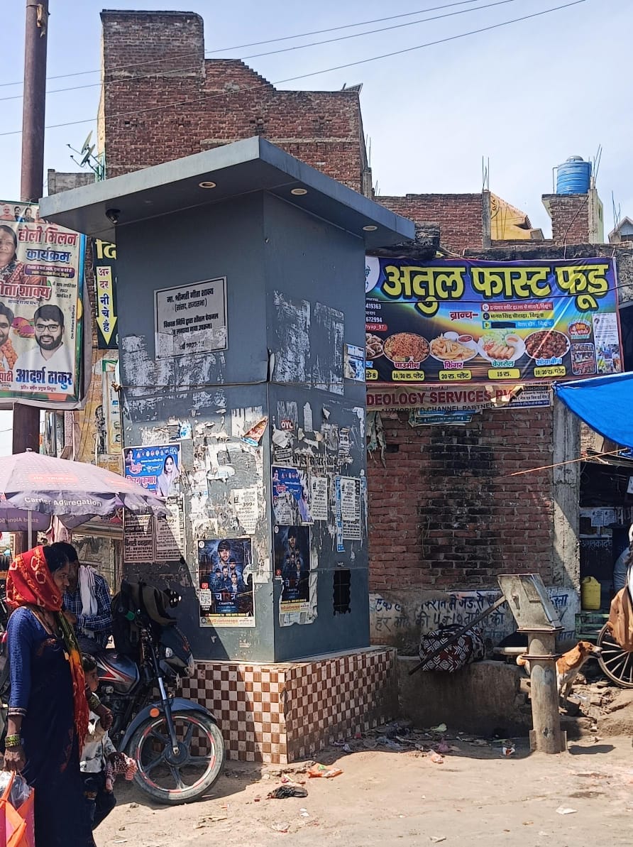 Water coolers are a showpiece in the summer, passersby are buying water and drinking it.