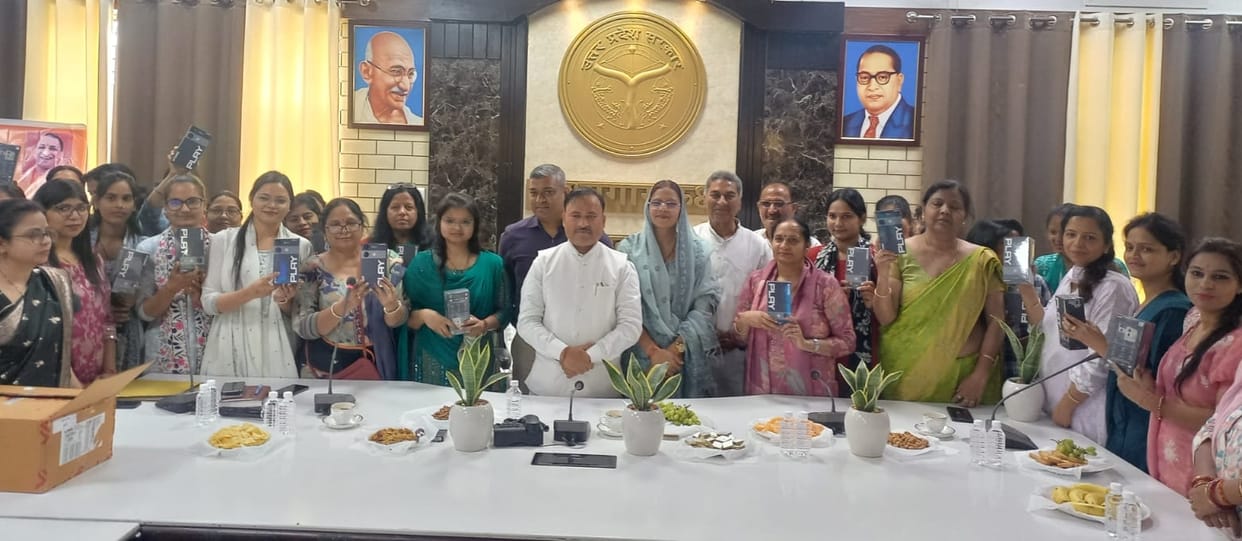 Appointment letters and smartphones distributed to Anganwadi workers and assistants.